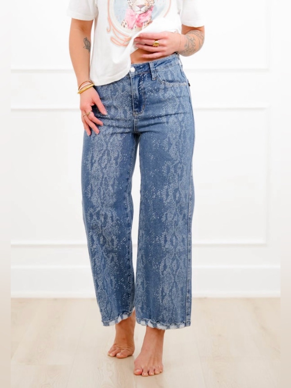 NEW WITH TAGS. 
Judy Blue High Rise Snake Print Wide Leg
Ankle Jeans. Size 0/24